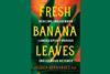 A cover of the book that features a drawing of large green leaves on an orange background. Over the top of the image, large captial letters spell out 'Fresh Banana Leaves'